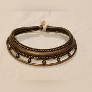 Unique shape metal bracelet from boutique Wicked Peacock